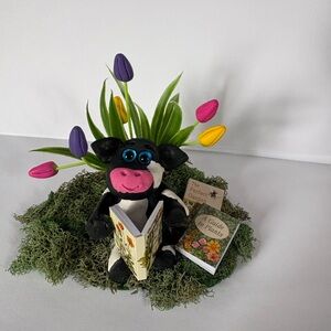 Whimsical Cow in the Colorful Tulips